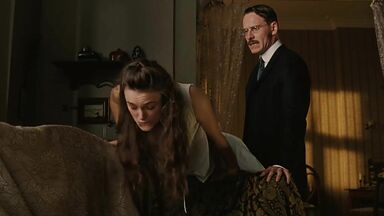 Keira Knightley spanked on the sofa