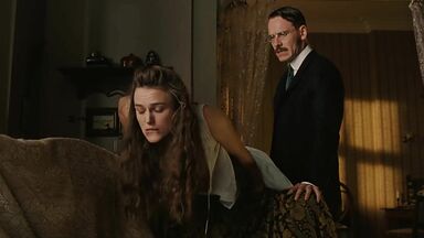 Keira Knightley spanked on the sofa