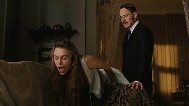Keira Knightley spanked on the sofa