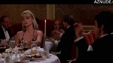 Michelle Pfeiffer she looks sexy at a restaurant table