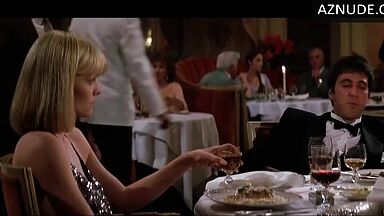 Michelle Pfeiffer she looks sexy at a restaurant table