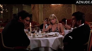 Michelle Pfeiffer she looks sexy at a restaurant table
