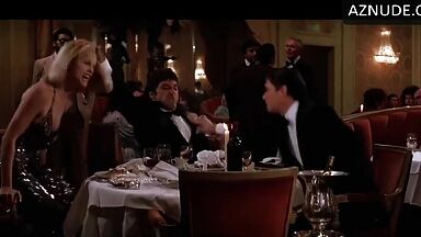 Michelle Pfeiffer she looks sexy at a restaurant table