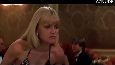 Michelle Pfeiffer she looks sexy at a restaurant table