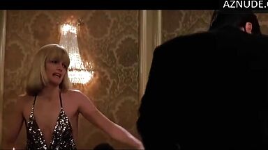 Michelle Pfeiffer she looks sexy at a restaurant table