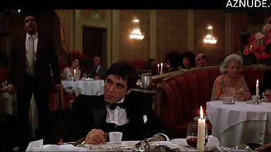 Michelle Pfeiffer she looks sexy at a restaurant table