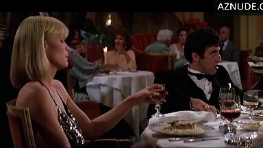Michelle Pfeiffer she looks sexy at a restaurant table