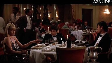 Michelle Pfeiffer she looks sexy at a restaurant table