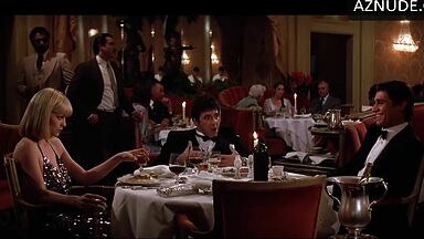 Michelle Pfeiffer she looks sexy at a restaurant table
