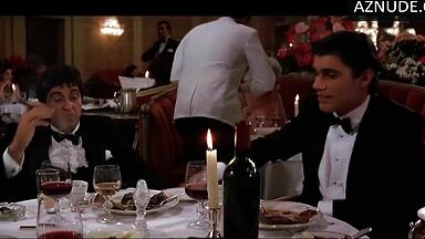 Michelle Pfeiffer she looks sexy at a restaurant table
