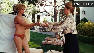 Julia Roberts in a pink swimsuit