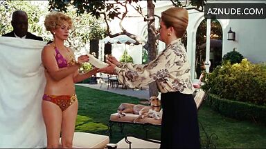 Julia Roberts in a pink swimsuit