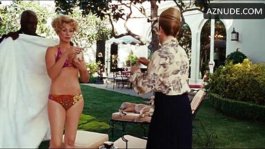 Julia Roberts in a pink swimsuit