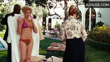 Julia Roberts in a pink swimsuit