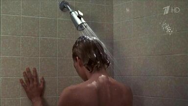 Michelle Pfeiffer coming from the shower in a towel