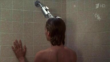 Michelle Pfeiffer coming from the shower in a towel