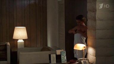 Michelle Pfeiffer coming from the shower in a towel
