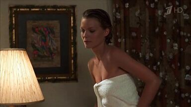 Michelle Pfeiffer coming from the shower in a towel