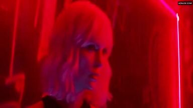 Sofia Boutella and Charlize Theron having sex in a club bathroom