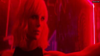 Sofia Boutella and Charlize Theron having sex in a club bathroom