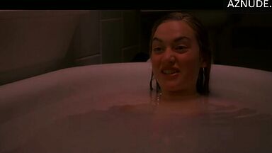Kate Winslet is in the empty bathtub