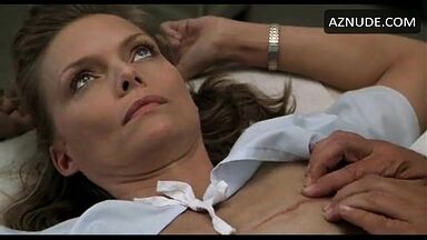 Michelle Pfeiffer palpated by a doctor
