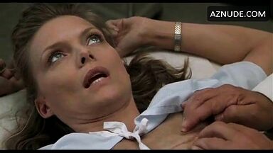 Michelle Pfeiffer palpated by a doctor