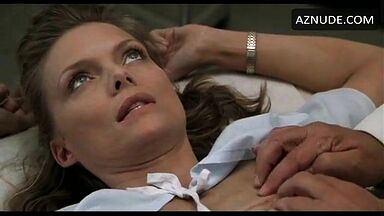 Michelle Pfeiffer palpated by a doctor