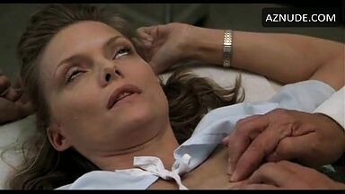 Michelle Pfeiffer palpated by a doctor