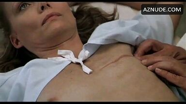 Michelle Pfeiffer palpated by a doctor