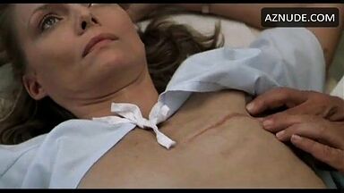 Michelle Pfeiffer palpated by a doctor