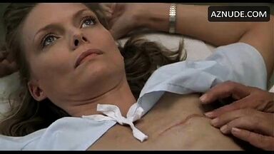 Michelle Pfeiffer palpated by a doctor