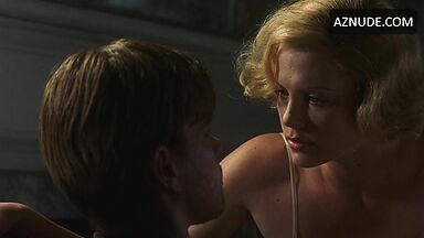 Charlize Theron french kissing a stranger