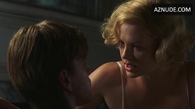 Charlize Theron french kissing a stranger