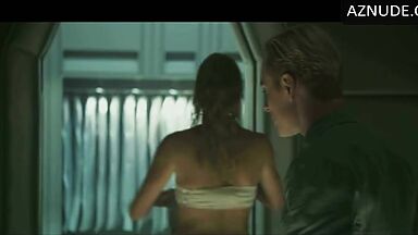 Charlize Theron does push-ups while wet