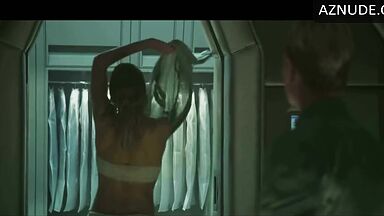 Charlize Theron does push-ups while wet