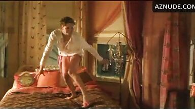 Charlize Theron having fun at the head of the bed