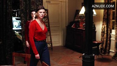 Charlize Theron is sexy in her red shirt