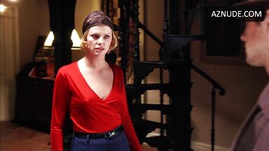 Charlize Theron is sexy in her red shirt