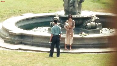Keira Knightley emerges from a well wet
