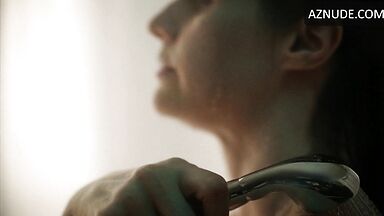 Alexandra Daddario showering